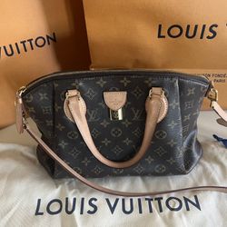 Louis Vuitton Rivoli MM Handbag 