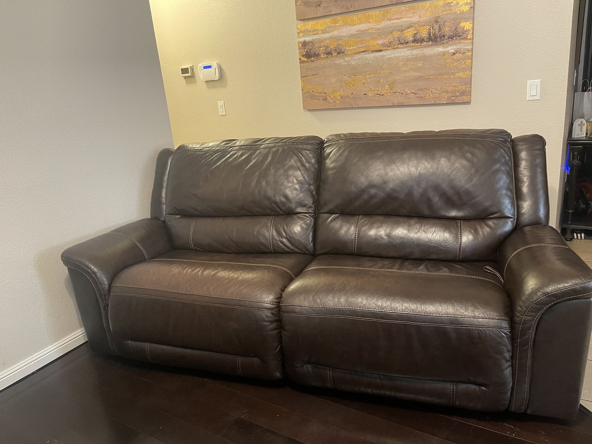 2 Leather Reclining Sofas – Manual Recline, Good Condition