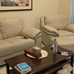 LEATHER LOVESEAT AND OVERSIZED CHAIR