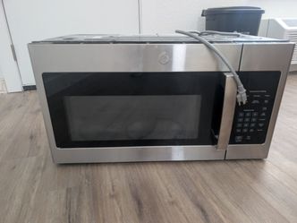 GE microwave brand new in box $150
