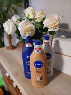 Detergente gain ,tide, arm &hammer  y cremas nivea