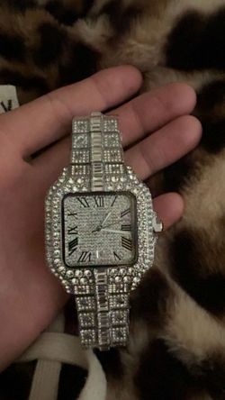 Iced out Cartier watch