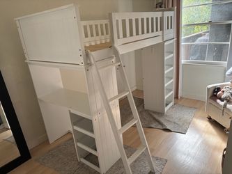 Free white loft bed.