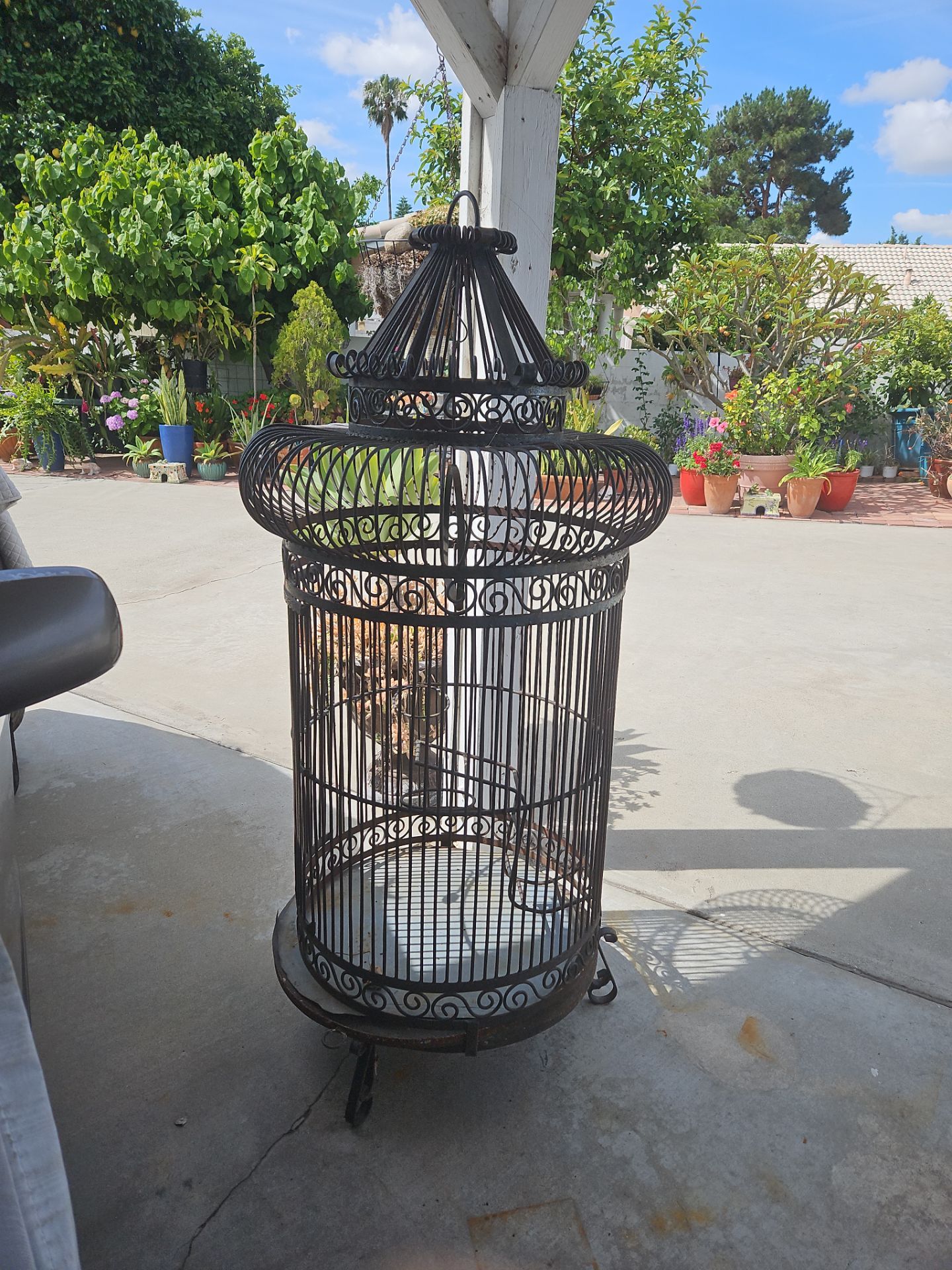 Huge Solid Wrought iron birdcage 5 feet tall a little over 2 feet wide very heavy