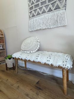 Wooden Bench and Hanging Tapestry