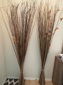Tall decorative dried grass bundles