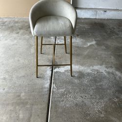 Set Of Four Beige Upholstered Counter Height Stools