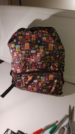 F.A.B. back pack with multi colored owls