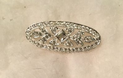Sparkling silver stone-studded pin