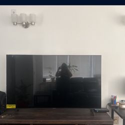 New In Packaging 65” UHD LG TV