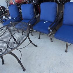 $1000  ARIZONA IRON BIG SWIVEL CHAIRS AND TABLE WITH NEW CUSHIONS 