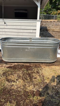 2 water troughs. Used as elevated garden beds