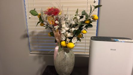 Vase with flower arrangement