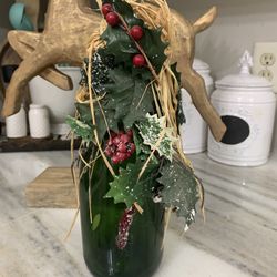 Christmas bottle.  Has a hole for lights