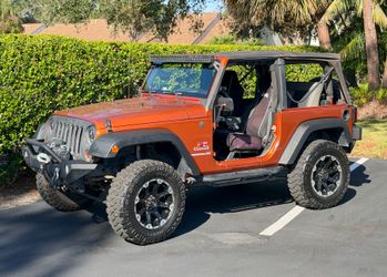 2010 Jeep Wrangler Sport.   Set up right