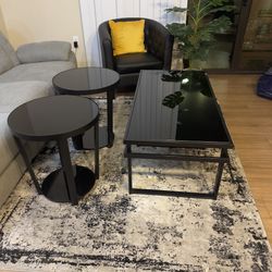 Coffee table and two side tables $150