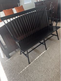 Spindle back black bench