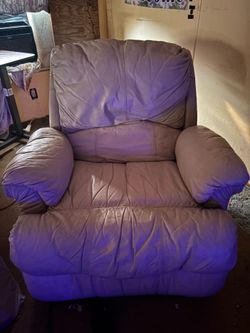Large beige faux leather recliner