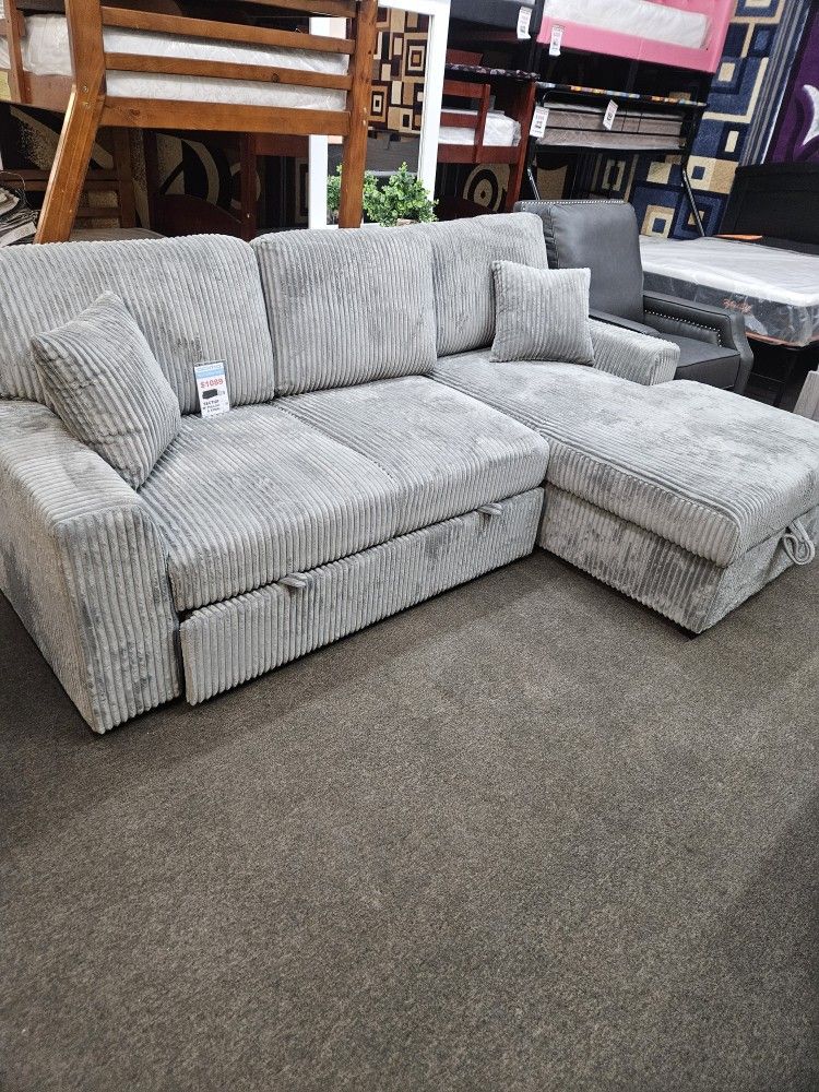 New sectional with pullobed and storage $899
