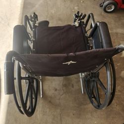 Wheelchair With Leg Attachments 