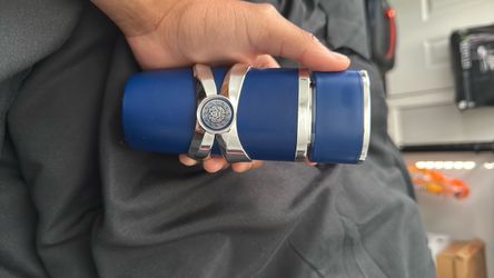 Blue and Silver Cylindrical lattafa Perfume Bottle