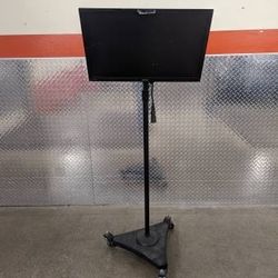 24" monitor mounted on a tall floor stand with rollers casters Rolling