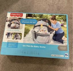 Fisher-Price Portable Bassinet and Play Space On-The-Go Baby Dome with Developmental Toys and Canopy