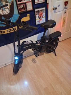 Electric Adult bike great condition everything works its knew