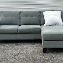 MICROFIBER SECTIONAL SOFA W REVERSIBLE CHAISE by H. M. RICHARD’S - delivery is negotiable