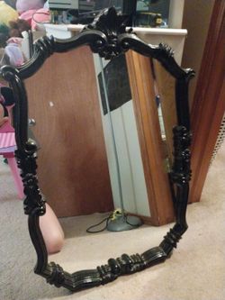 Vintage black frame mirror.
