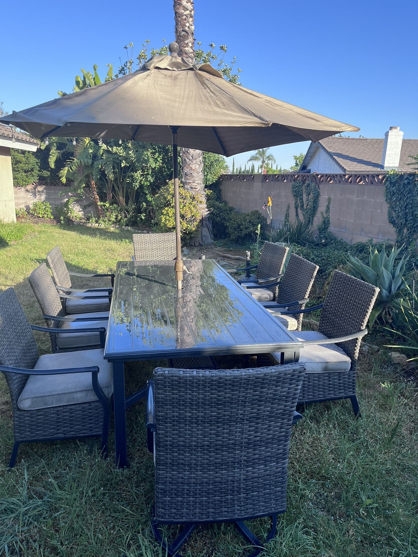Aluminum Table And Chairs With An Umbrella