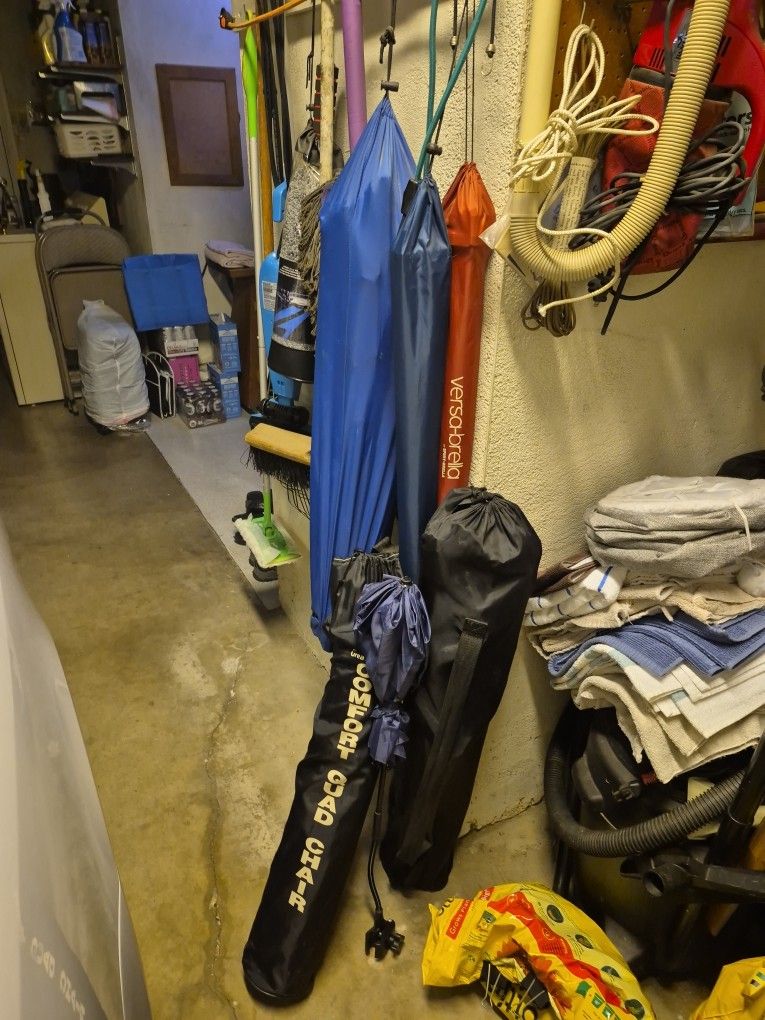 Folding Chairs And Attachable Umbrellas Perfect Condition. Only Used A Few Times