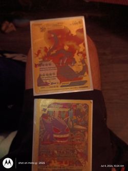 Gold Gengar and Charizard Pokemon cards