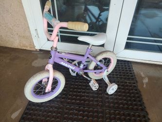 12" girls bike with training wheels