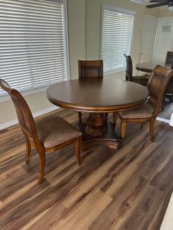 4 feet table  and 4 chairs