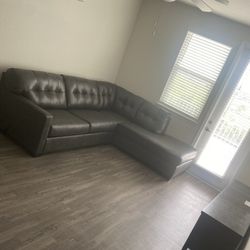 black battstone sectional with chaise