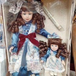 2 Porcelain Dolls