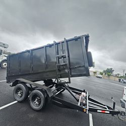 NEW DUMP TRAILER 12X8X4 12000 LBS
ROLLING TARP--SPARE TIRE,ELECTRIC BRAKES,HYDRAULIC SYSTEM,REMOTE CONTROL,IDEAL FOR HAULING, DEMOLITION, TRASH ETC,