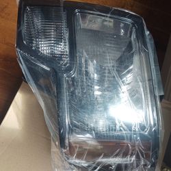 New 2009-14 Ford F250 Left Headlight Assy