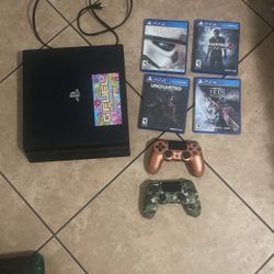 PS4 PRO 1TB 4 Great Games 2 Controllers