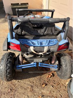 Kids electric off road  car.   Needs battery