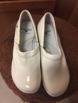 Nursing shoes and one pair black high heel $10.00 each for each pair