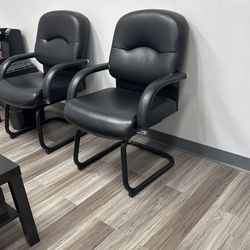 2 Cushioned Office Chairs 