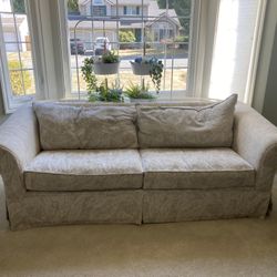Cream/Tan Couch With Leaf Pattern