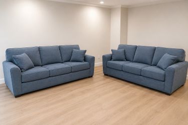 Blue upholstered three seat sofa couch 95” x 42”