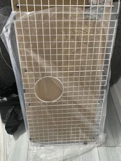 Stainless steel sink grid and protector