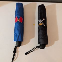 One Piece pirate and Sailor Moon themed umbrellas
