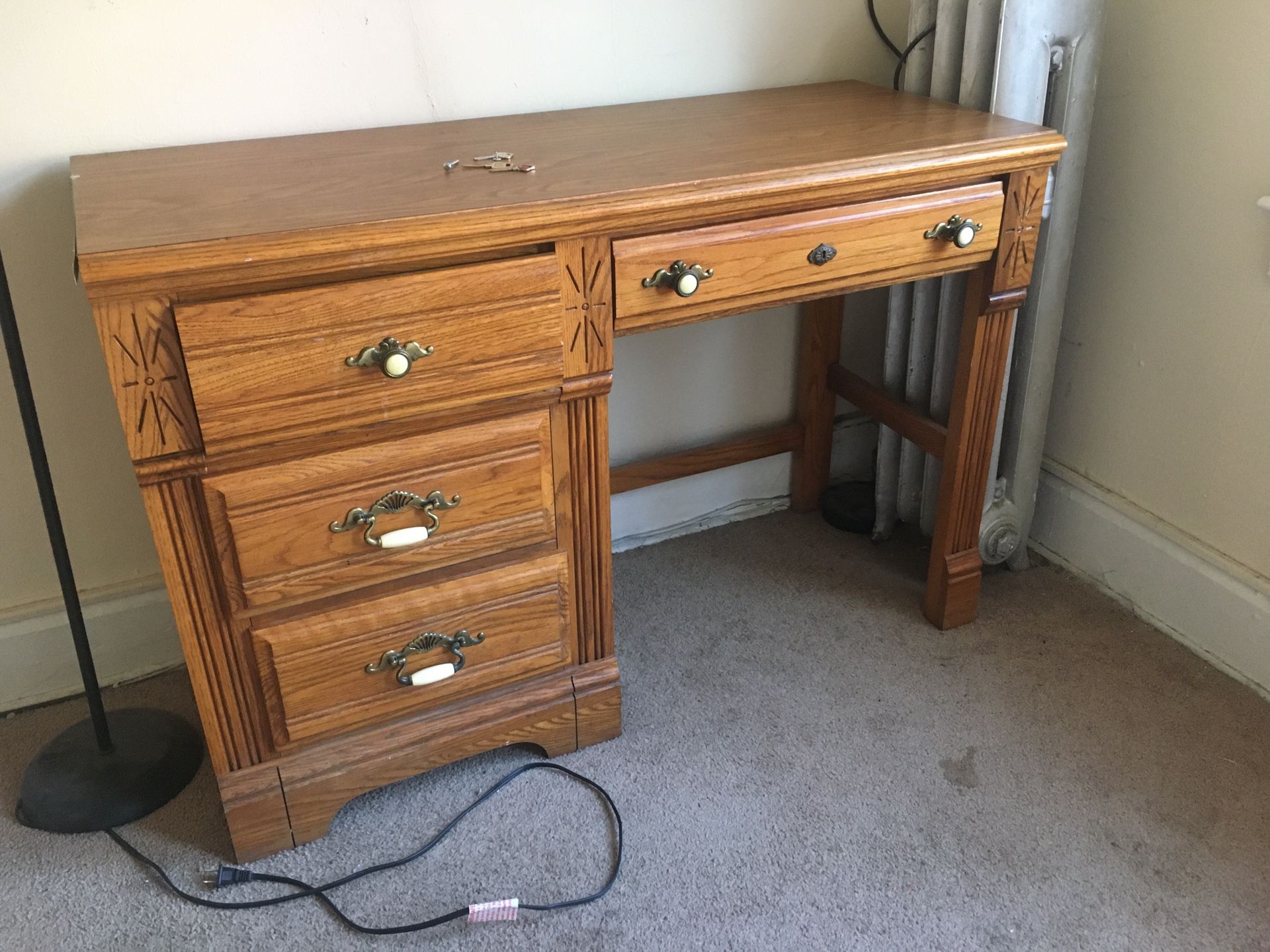 Vintage wooden desk with drawers