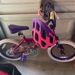 Young Girls Bike And Toys