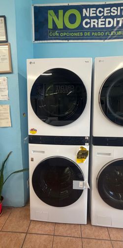 LG WashTower Stacked Center 4.5 Cu.Ft. Front Load Washer & 7.4 Cu.Ft. Electric Dryer 